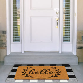 Maitys buffalo plaid hello mat blends farmhouse charm with quick-dry fibers.