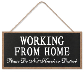 Maitys working from home sign on front door signals private workspace