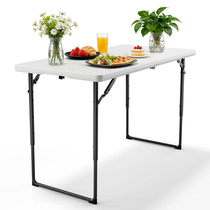 MAKE CHANGES 4FT folding table ready for outdoor dining, sturdy and portable.