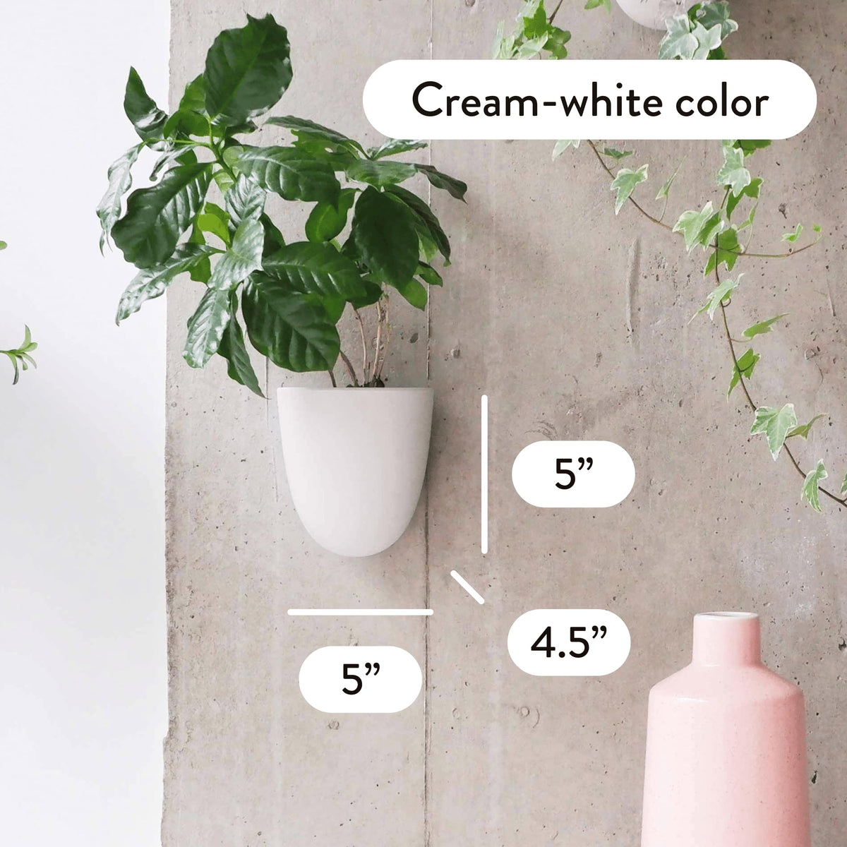 PlantPod Luxe wall planters installed with a single nail for quick setup.