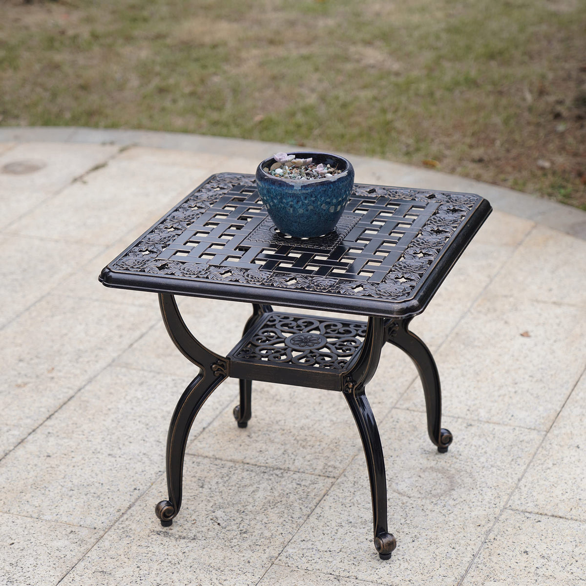 Mandolin outdoor side table close-up shows weave design for stable placement.