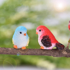MAOMIA bird figurine in profile; enhances fairy garden scenes with delicate charm.