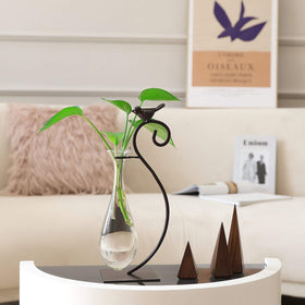 Marbrasse desktop glass planter with bird stand detail, adds a lively focal point.