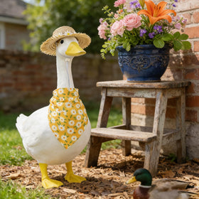 Mason Life full ensemble on goose statue brightens outdoor display.
