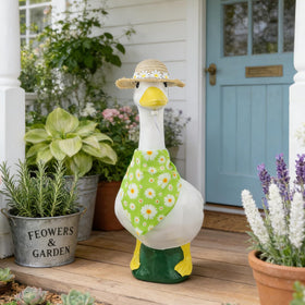 Mason Life garden scene with goose wearing daisy outfit.