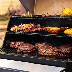 Masterbuilt Gravity Series 1050 warming racks for keeping food warm