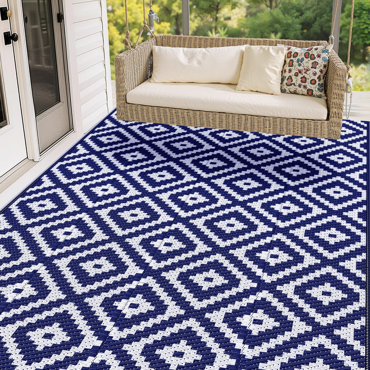 Mattitude waterproof outdoor rug laid on a blue patio for durable outdoor use