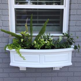 Mayne Nantucket window box in use shows lush seasonal color outdoors.