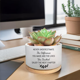 MBRUH planter with drainage hole and wood saucer protects surfaces