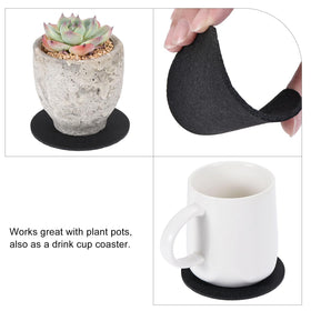 MECCANIXITY round felt coasters absorb moisture around pots and mugs.