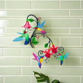 Meduofon hummingbird sunlit metal art reflecting light for outdoor sparkle.