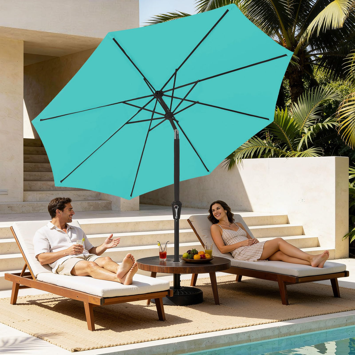 Push-button tilt on MEWAY teal umbrella for adjustable shading.
