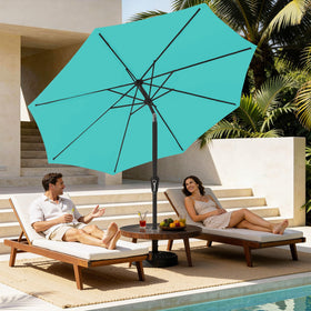 Push-button tilt on MEWAY teal umbrella for adjustable shading.