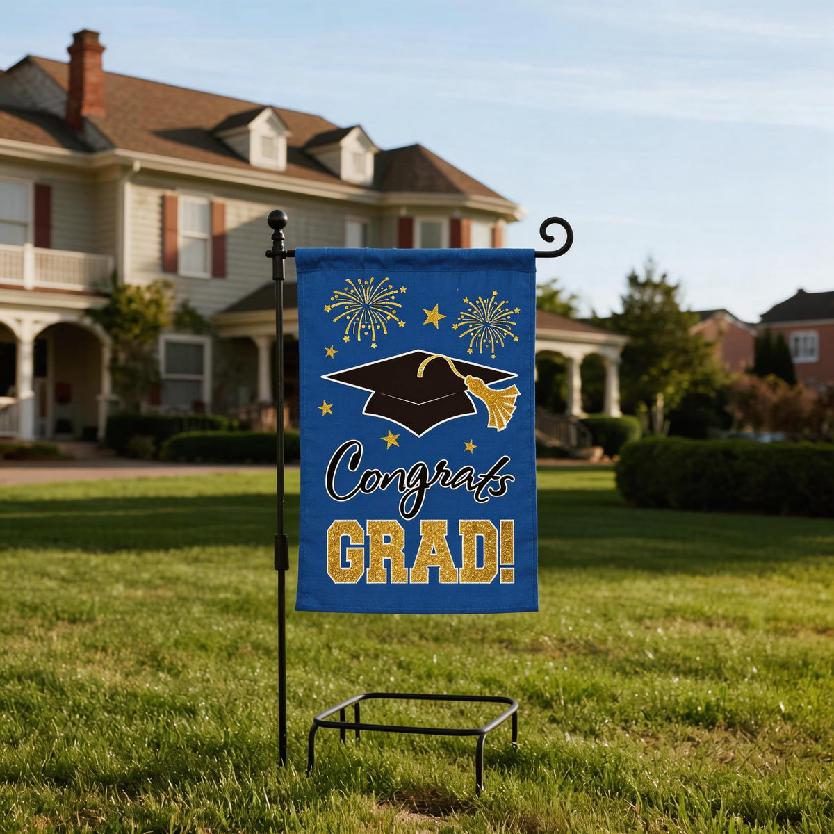 MEGLORT blue congrats grad flag hanging on a pole demonstrates easy setup.