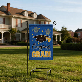 MEGLORT blue congrats grad flag hanging on a pole demonstrates easy setup.