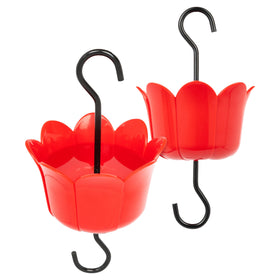 MEKKAPRO ant moat guard attached to a hummingbird feeder deterring ants.