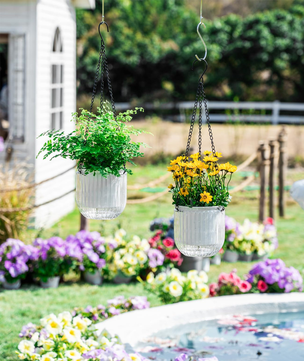Melphoe outdoor white hanging plant basket with visible water level.