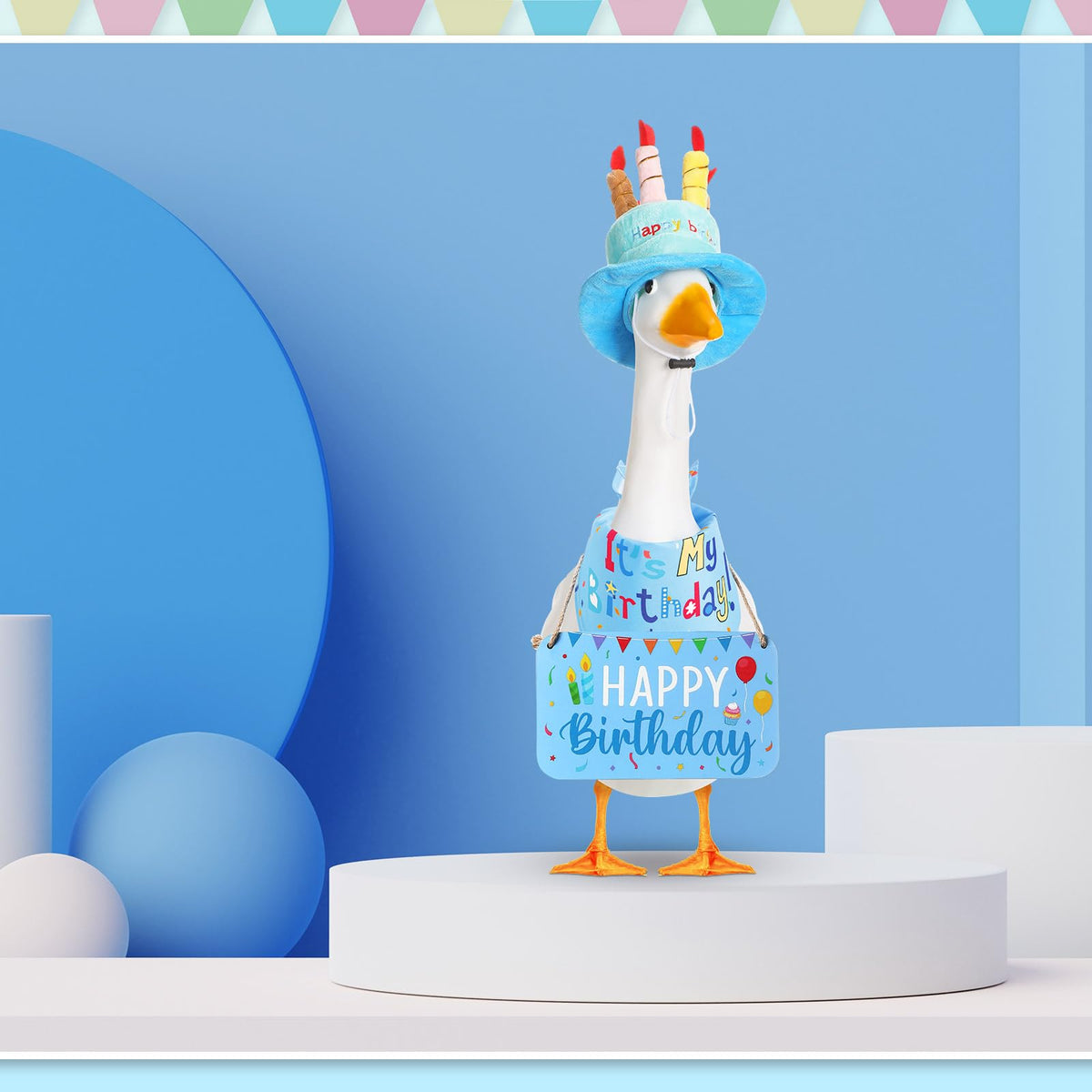 Memorywuu Goose wearing birthday costume on cement statue