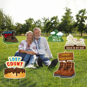 Memorywuu over-the-hill roadblock-shaped sign cues party theme with humor