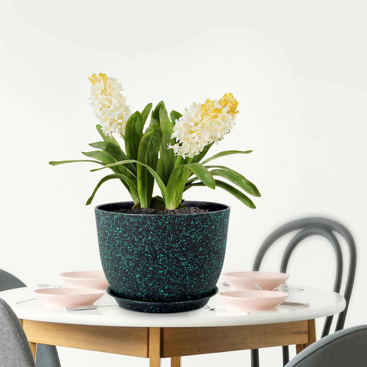 Meowell planters bring color and structure to patios and balconies.