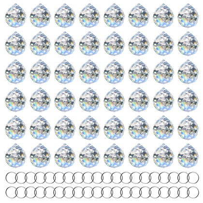 MerryNine clear crystal ball prism glows with rainbows on sunlit windows