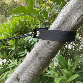 Mesench garden tree-support kit protects new plantings in windy weather.