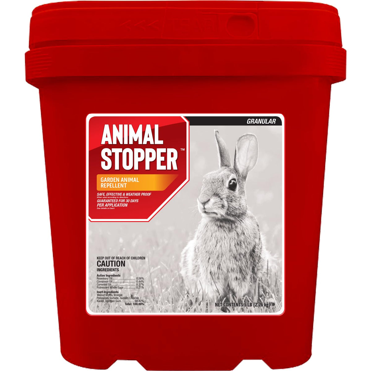 Messinas Animal Stopper Granular being poured to protect a garden bed from pests