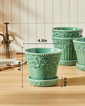 Metahom ceramic pot with green glaze provides a durable, timeless accent.