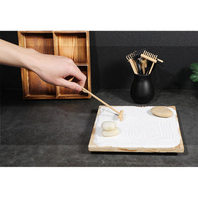 Desktop zen garden promotes creative focus and inner balance.