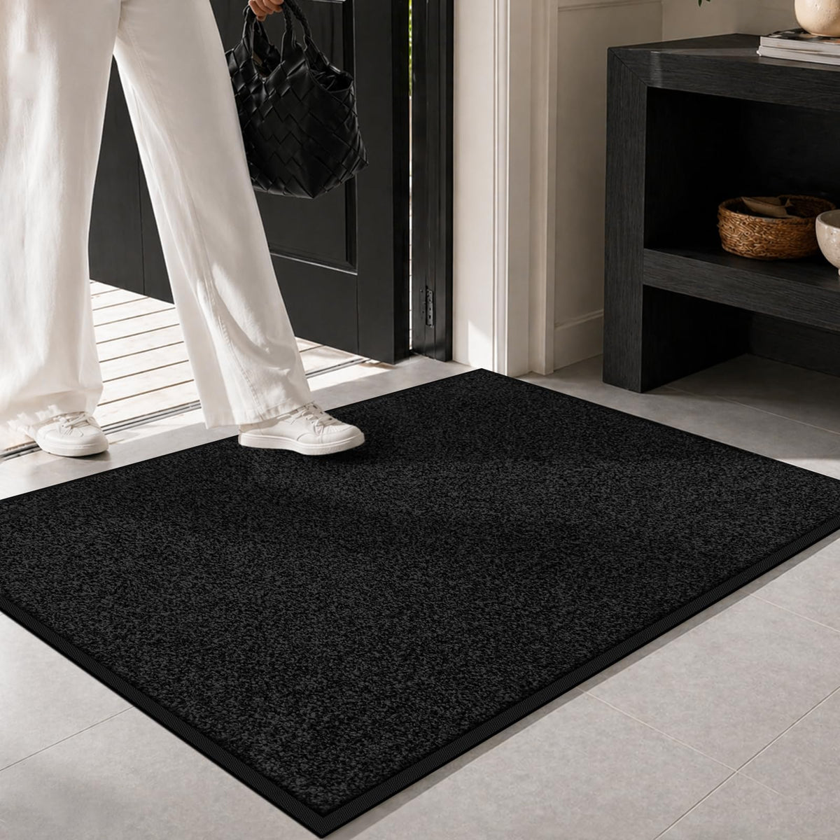 Mibao indoor-outdoor mat demonstrates weatherproof durability for all-season entryways.