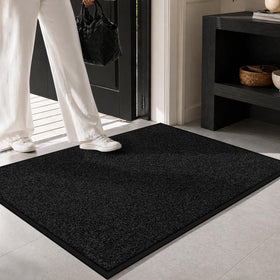 Mibao indoor-outdoor mat demonstrates weatherproof durability for all-season entryways.