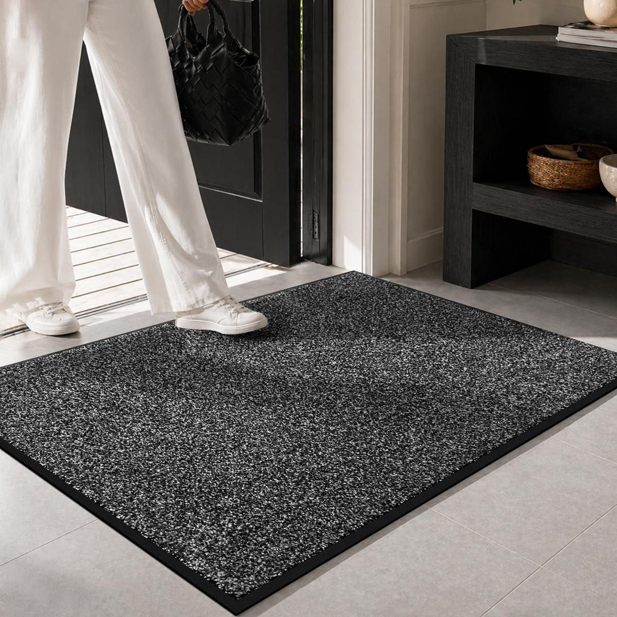 Non-slip backing keeps the Mibao mat steady at busy entryways