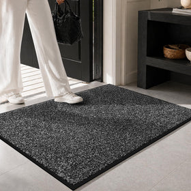 Non-slip backing keeps the Mibao mat steady at busy entryways