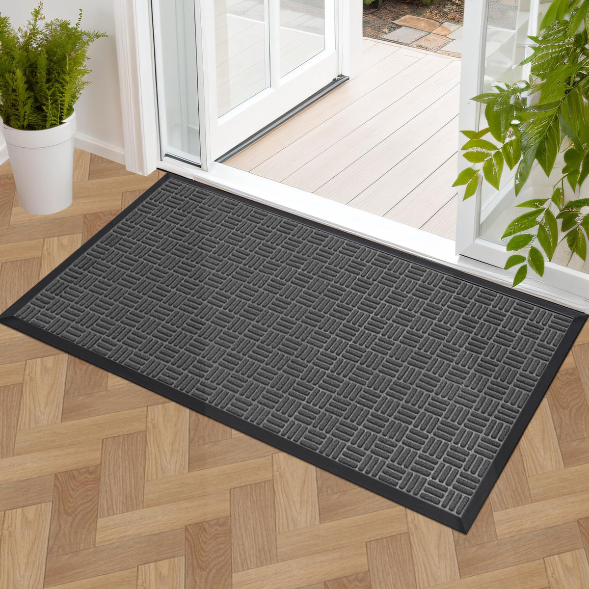 Mibao front door mat traps dirt and moisture from shoes.