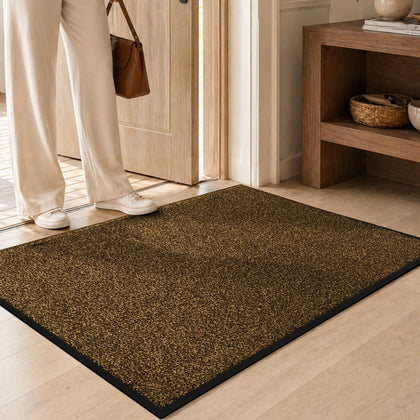 Mibao dirt-trapper front door mat brown catching dirt at the doorway