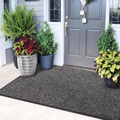 Mibao front door mat dirt trapper captures mud at the threshold for cleaner floors.