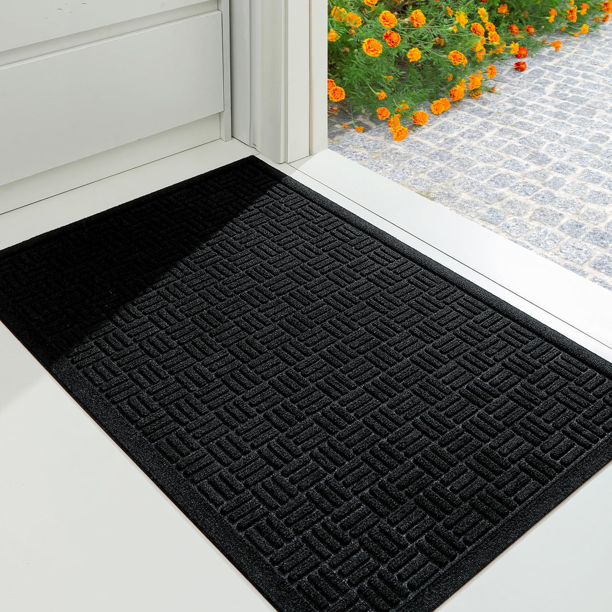 Durable, anti-slip mat design protects entry floors.