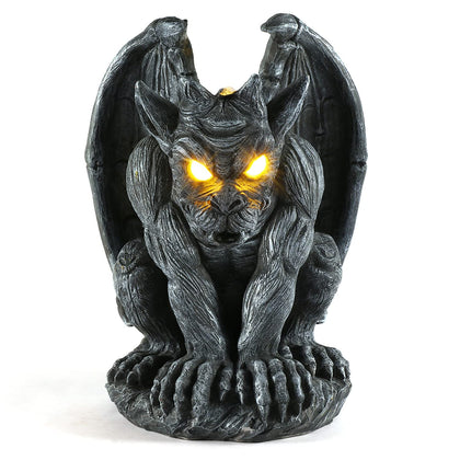 MIBUNG gargoyle solar-light outdoor statue illuminates paths at night.