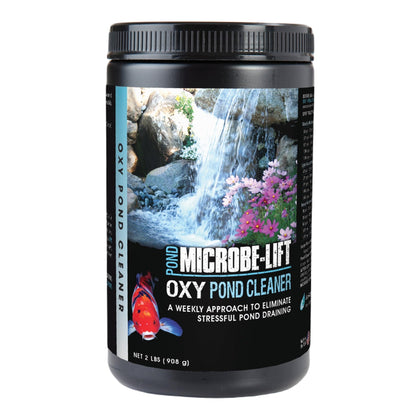 Microbe-Lift OPCSM pond cleaner breaks down debris around rocks and waterfalls.