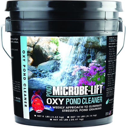 MICROBE-LIFT OPCMD on rocks removes debris for clearer pond edges.