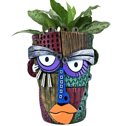 Midogaigai abstract face planter pot adds quirky art to desks and shelves.