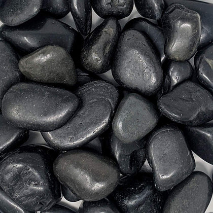 Midwest Hearth polished black pebbles 1-3 inch bag add decorative garden accents.