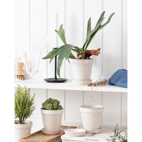 MIKIGEY embossed flower pot close-up shows elegant texture
