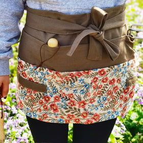 MILCIL apron side pocket view showing eight tool pockets for organization