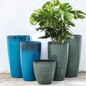 MinCHI257 21-inch tall planter with gradient green finish for versatile corner decor.