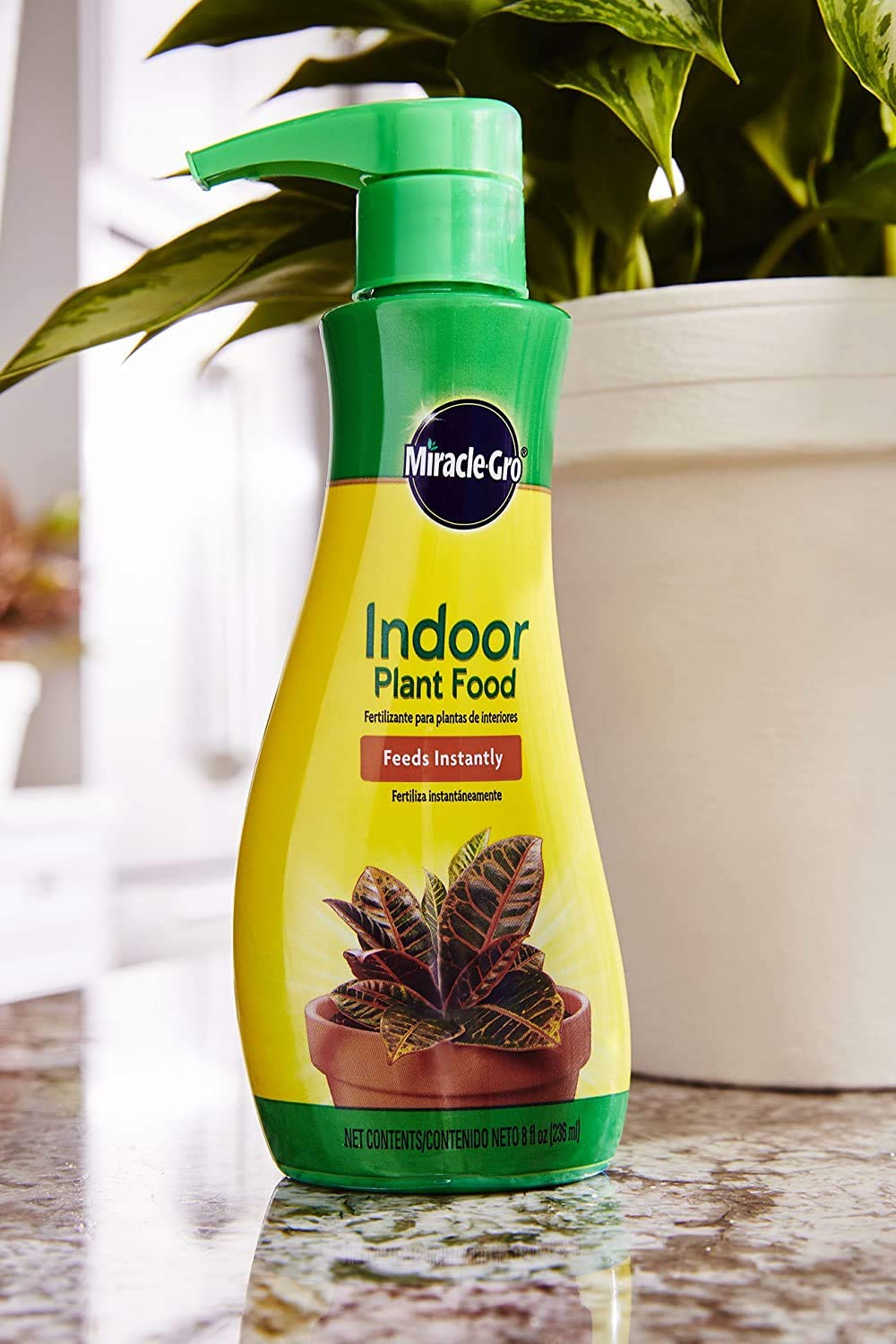 Miracle-Gro Indoor Plant Food two-pack shows convenient bundle for multiple planters.