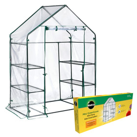 Miracle-Gro Mini Walk-In Greenhouse front view, compact protection for herbs and seedlings.