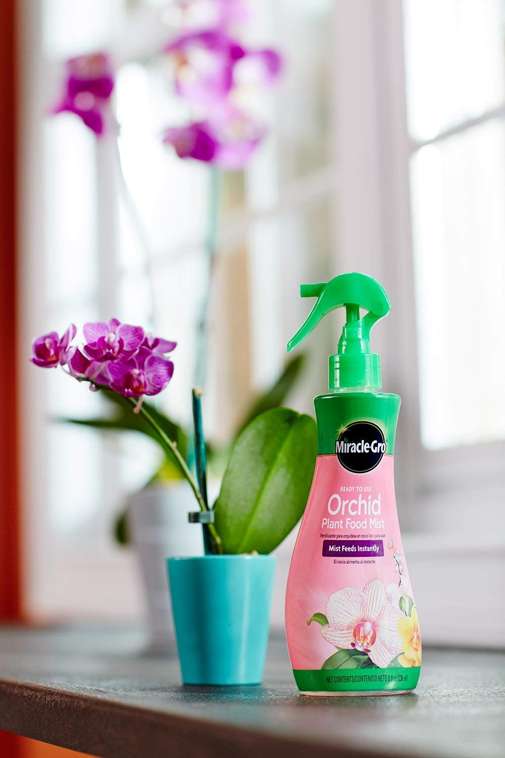 Miracle-Gro Orchid Food Mist spray action delivering quick nutrients