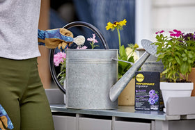 Miracle-Gro Performance Organics Blooms covers up to 265 sq ft with garden feeder