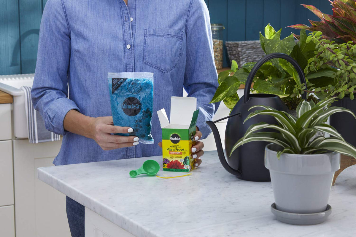 Miracle-Gro Plant Food dissolving in water nourishes roots